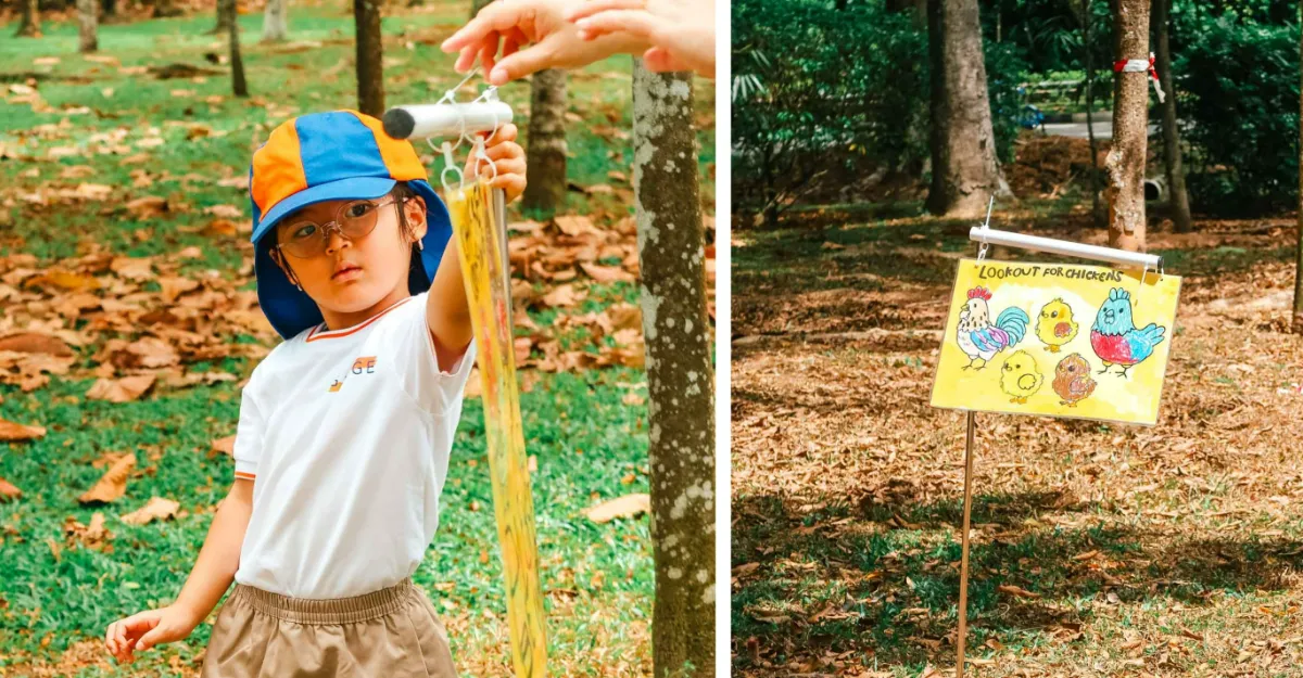 A child‑led project comes to life as preschoolers install their chicken crossing signs outdoors.