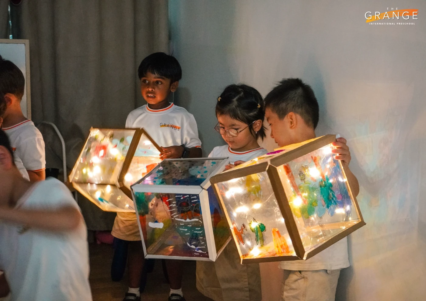 Learning through trial and error, students tested different ways to make their lightboxes work.